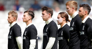 England players wearing black Tshirt