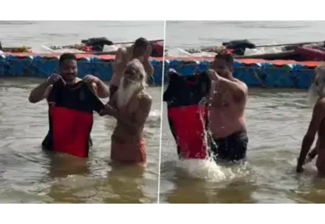 [WATCH] RCB Fan Takes RCB Jersey To MahaKumbh Mela