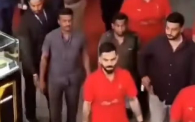 [WATCH]- Virat Kohli Signs Fan’s Painting Despite Security Restriction At RCB IPL 2025 Event