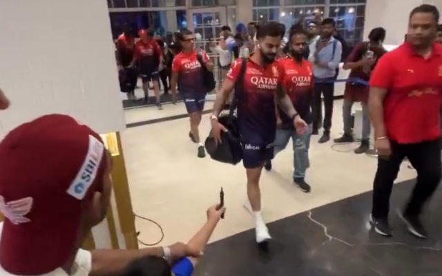 [WATCH]- Virat Kohli Spots Young RCB Fan, Signs Poster Retrieved By Security Staff In Team Bus