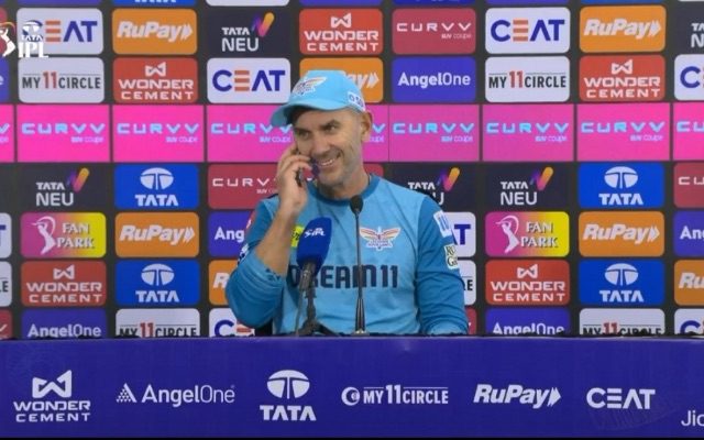 [WATCH]- Justin Langer Takes Reporter’s Mom’s Call, Gives Mayank Yadav Update