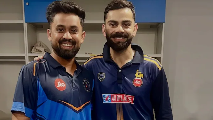 [WATCH]- Virat Kohli Autographs Match Ball For Gujarat Bowler Vishal Jayswal