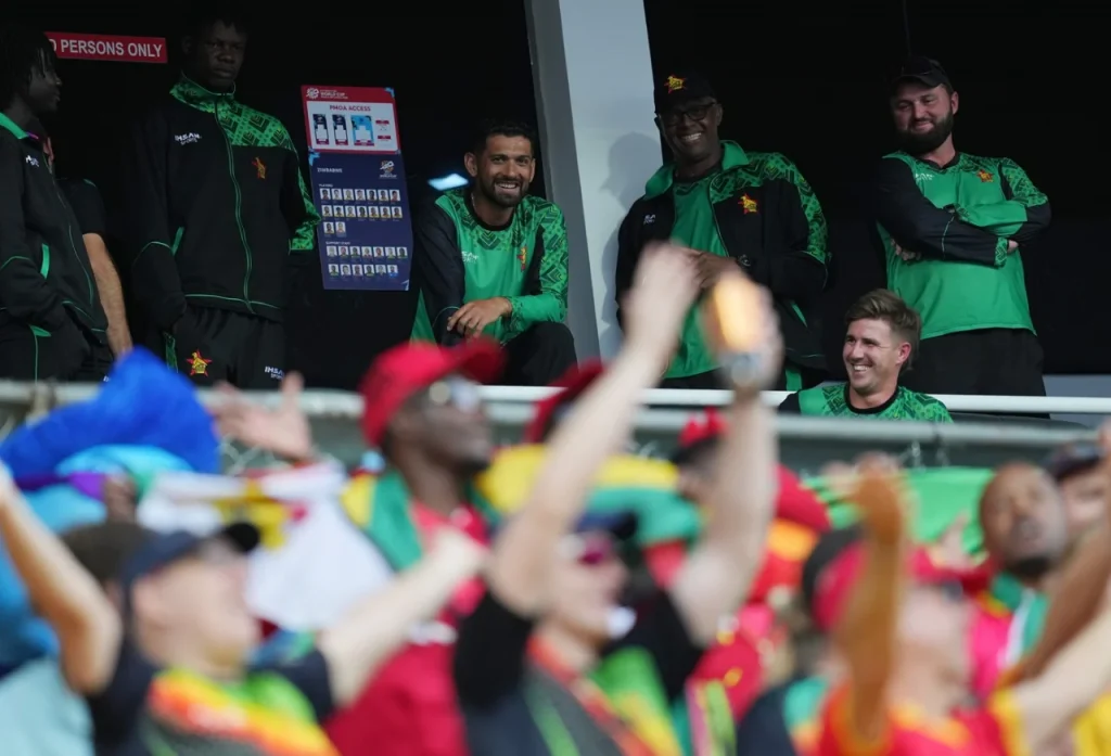 Sikandar Raza looks on as fans are celebrating after Zimbabwe qualified for the Super Eight. (Image: Getty Images)